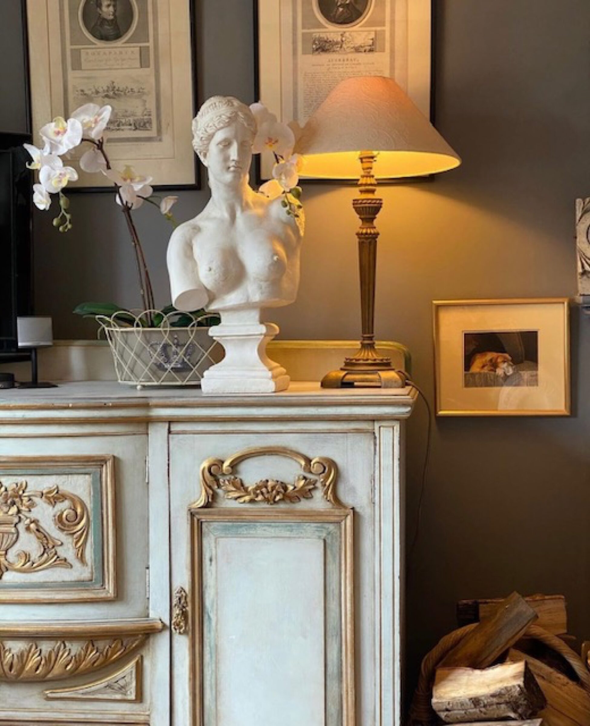 White stone bust on cabinet